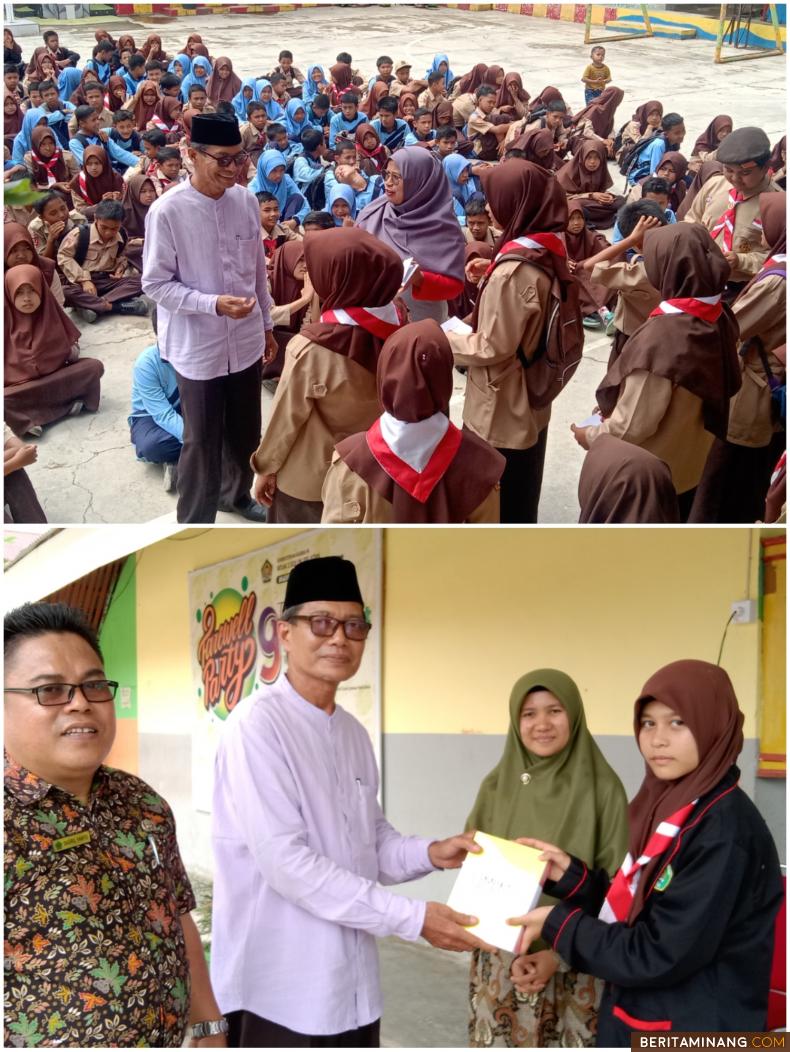 Kemad MTs Negeri 3 Solsel, Drs.  Marmis. MM saat penyerahan hadiah lomba dan penghargaan pada siswa yang berprestasi dibidang lomba dan ilmu pendidikan, sebelum menyerahkan rapor kenaikan kelas di madrasah tersebut, Sabtu (18/6/2022). Afrizal. A